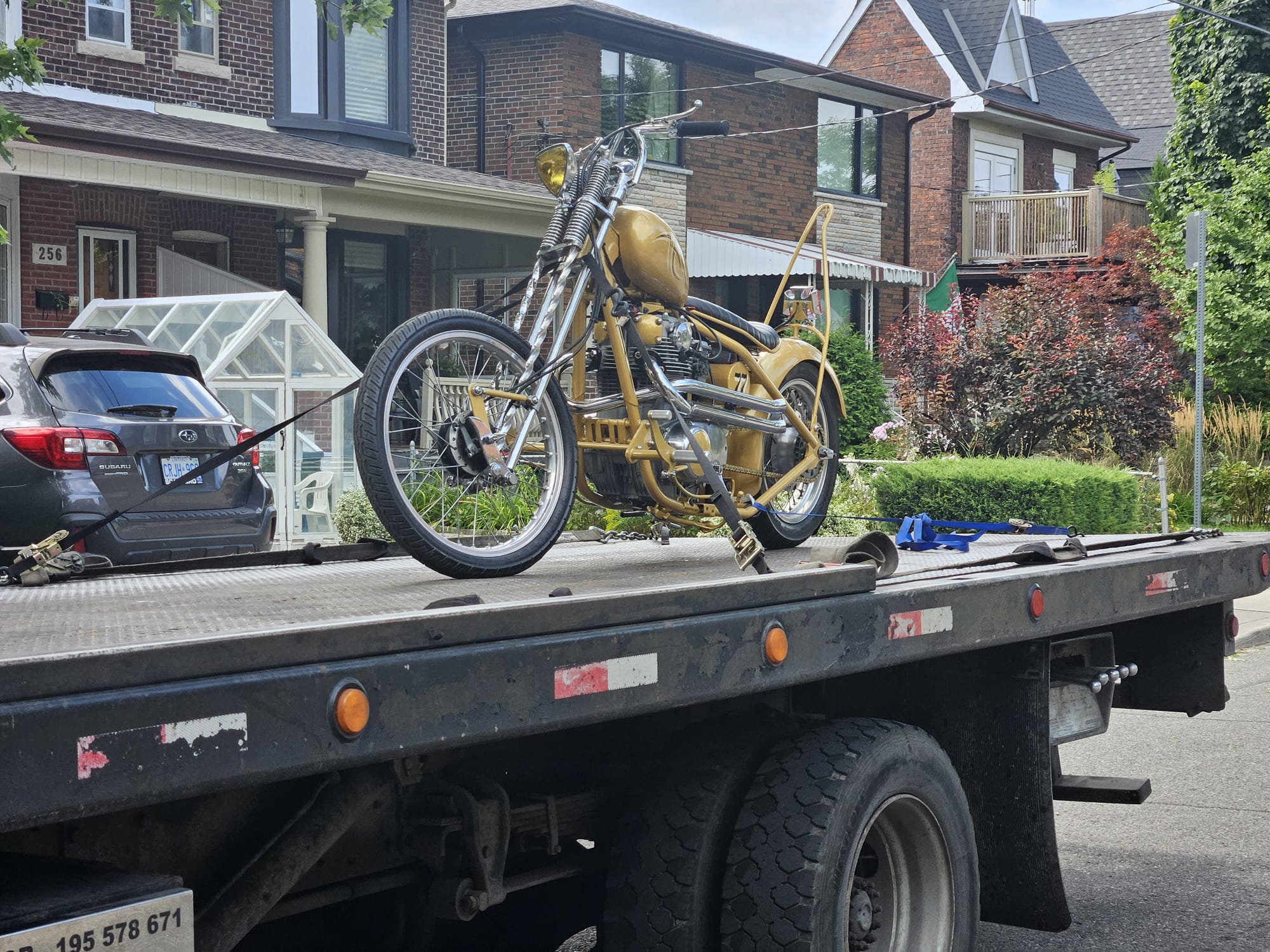 vintage motorcycle being towed